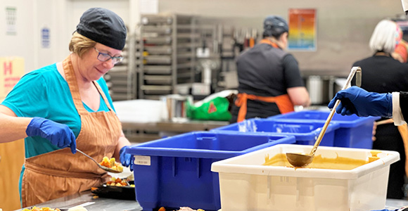 NZFN Food Hub, SuperGrans Tairawhiti, staff in kitchen making meal kits.