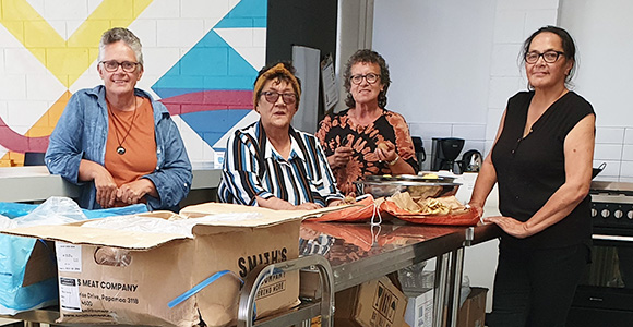 NZFN Food Hub, Waitara Foodbank Pataka Kai, staff in kitchen.